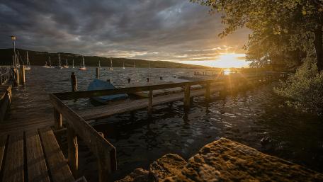 Serene Sunset Over Tranquil Lake Scene wallpaper