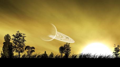 Majestic Sunset Over a Ringed Planet wallpaper
