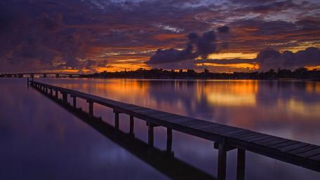 Serene Sunset Over Calm Waters wallpaper