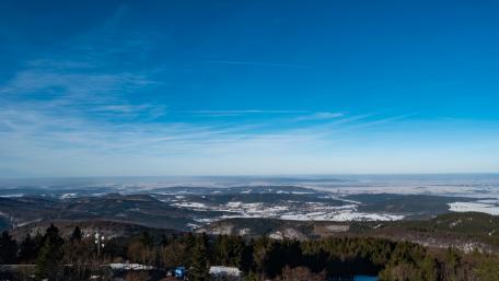 Majestic Winter Landscape Under Clear Blue Sky wallpaper