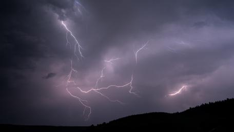 Dramatic Thunderstorm with Lightning Strikes in the Night Sky wallpaper