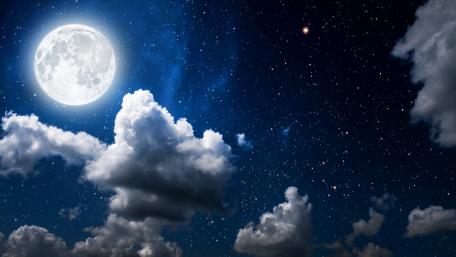 Majestic Full Moon Over a Starry Night Sky wallpaper