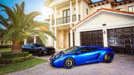 Dream Cars in Luxury Settings wallpaper