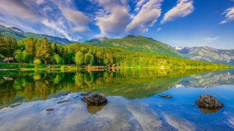 Tranquil Mountain Lake Reflection in Nature's Harmony wallpaper