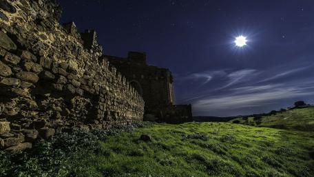 Mystical Castle Under the Starry Night Sky wallpaper