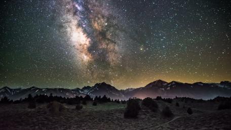 Majestic Milky Way Over Serene Landscape wallpaper