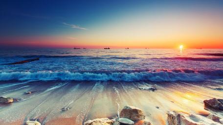 Foamy waves in the sunset wallpaper