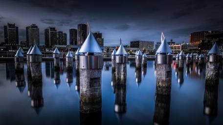 Wooden pylons in Yarra River Docklands (Melbourne) wallpaper