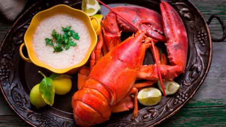 Delicious Lobster Feast Experience Freshness and Flavor wallpaper