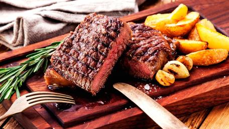 Juicy Roast Beef with Potato Wedges and Herbs wallpaper