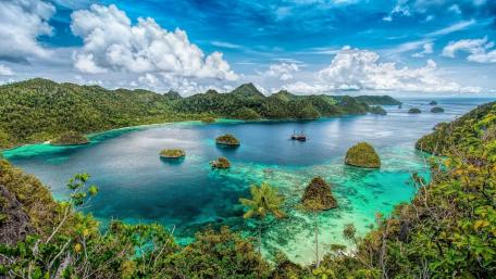 Tropical Paradise Overlooking a Serene Lagoon wallpaper