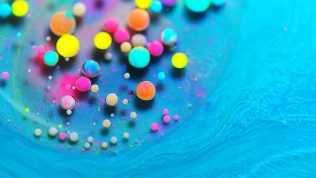 Vibrant Liquid Bubbles on Turquoise Canvas wallpaper
