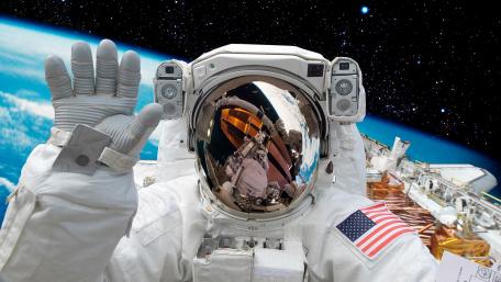 Astronaut's Reflection: Earth from the Space Station wallpaper