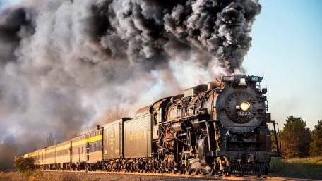 Majestic Steam Locomotive in Motion wallpaper