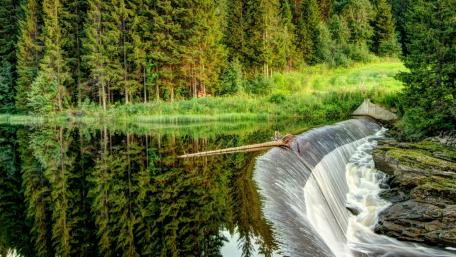 Tranquil Forest Reflections in Waterfall Scene wallpaper