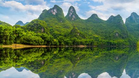 Mirrored Serenity in Nature's Peaks wallpaper