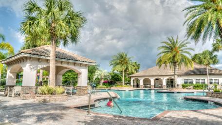 Swimming pool with palms wallpaper