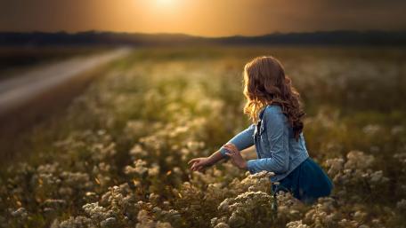 Girl in flower field wallpaper