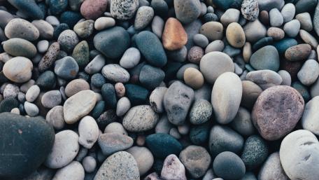 Textured Pebbles and Stones in Nature's Palette wallpaper