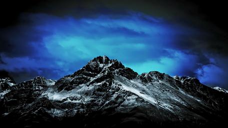 Midnight Peaks Under a Blue Sky wallpaper