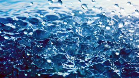 A Dance of Raindrops on Water Surface wallpaper