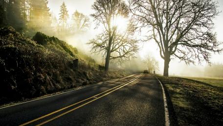 A single car on the road wallpaper