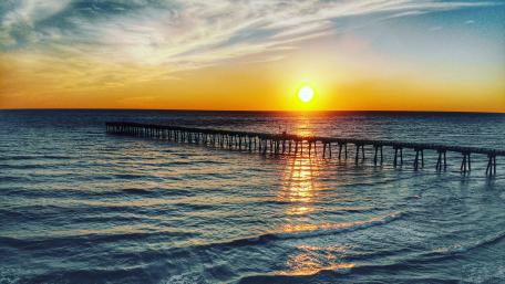 Long pier at sundown wallpaper