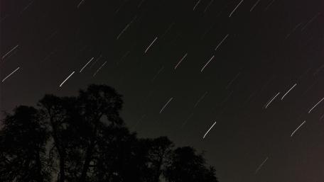 Long exposure star tracking wallpaper