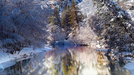 Winter's Tranquil Embrace: A Serene River Scene Double Hashtag wallpaper