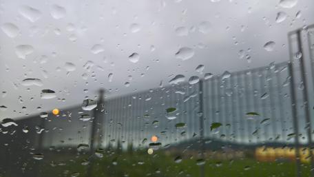 Rainy Day Serenity Beneath a Glistening Sky wallpaper
