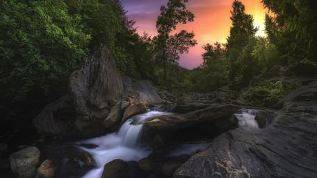 Serene Forest Waterfall Sunset Scene wallpaper