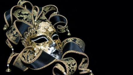Elegant Gold Masquerade Mask for Festive Spirit wallpaper