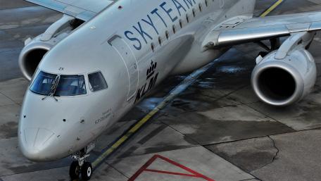 Sky-Ready Airliner on Airport Tarmac in 4K wallpaper