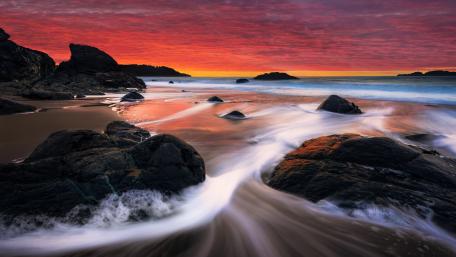 Red Sunset Waves at Dusk Beach wallpaper