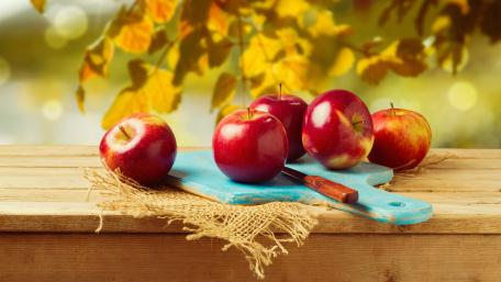 Autumn Apples on Wooden Table wallpaper