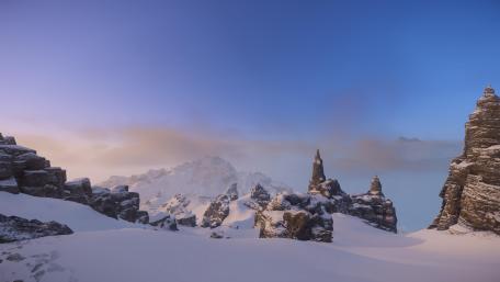 Majestic Mountains Under a Frosty Sky wallpaper