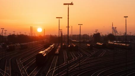 Sunset Over Trains and Rails Landscape wallpaper