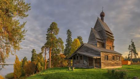 Serene Chapel Among Nature's Embrace wallpaper