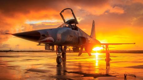 Majestic Fighter Jet at Sunset Glow wallpaper