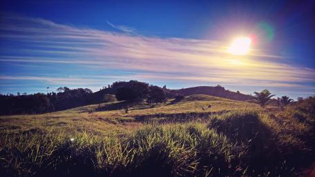 Serene Dawn Over Rolling Hills wallpaper