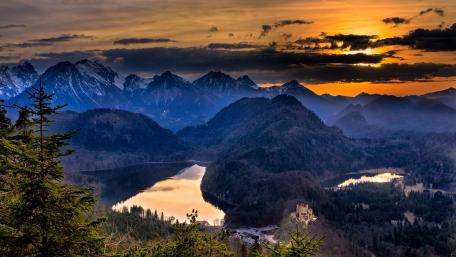 Bavarian Alps and the Hohenschwangau Castle in the distance wallpaper