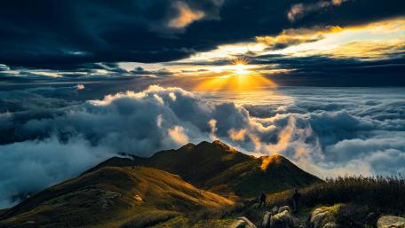 Majestic Dawn Over Serene Mountains wallpaper