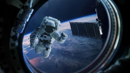 Astronaut's Journey Beyond Earth wallpaper