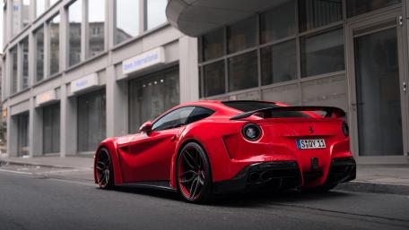Red Supercar in Urban Elegance wallpaper