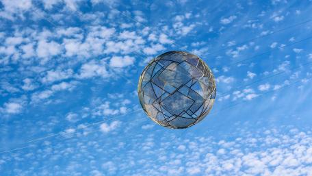 Spherical Art Against a Blue Sky wallpaper