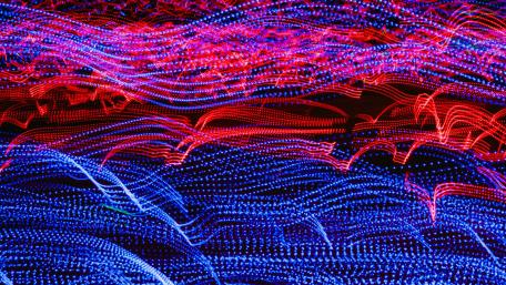 Vibrant Waves of Light Dance in Colorful Harmony wallpaper