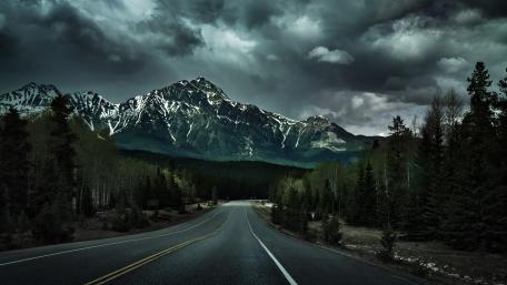 Cloudy mountain highway wallpaper