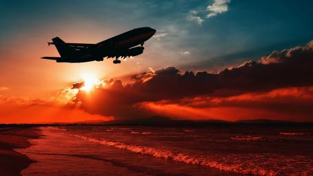 Airplane silhouette in the sunset wallpaper