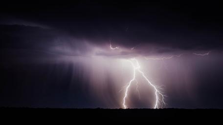 Electric Storm Illuminating the Night Sky wallpaper