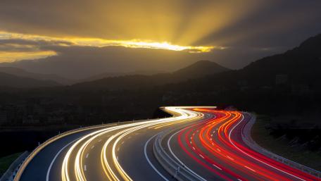 Light trails on highway - long exposure photography wallpaper